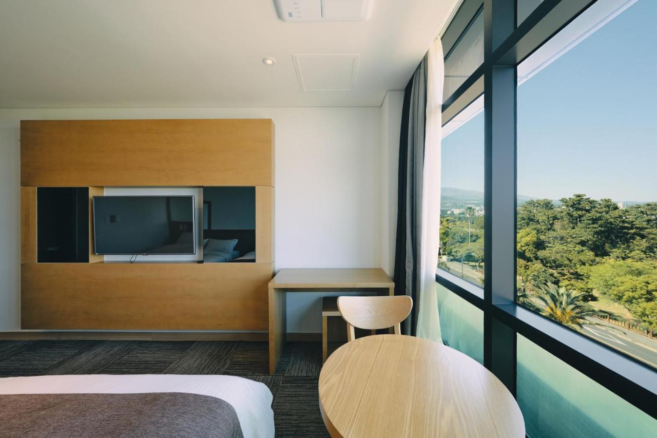 Jeju Poong Gyung Hotel Szogüpho Kültér fotó