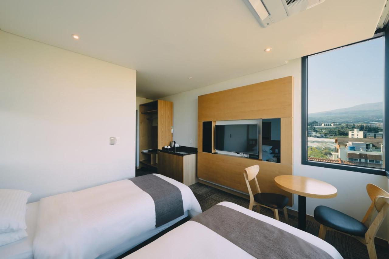 Jeju Poong Gyung Hotel Szogüpho Kültér fotó