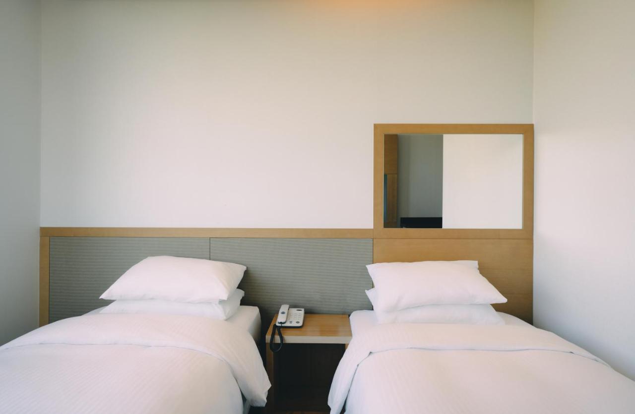 Jeju Poong Gyung Hotel Szogüpho Kültér fotó