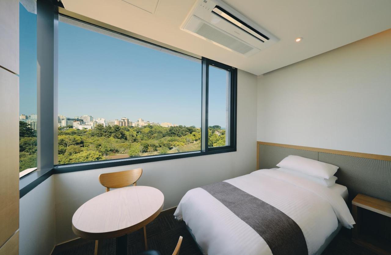 Jeju Poong Gyung Hotel Szogüpho Kültér fotó