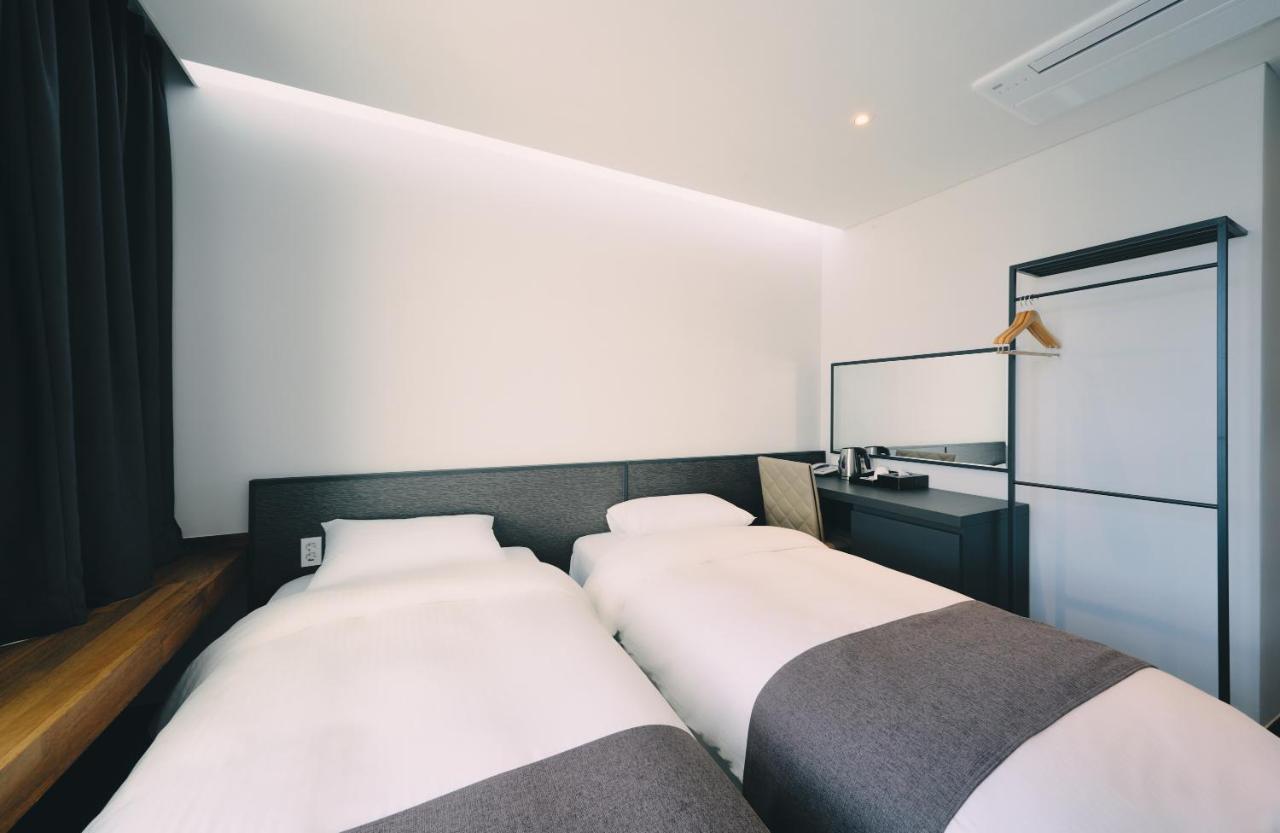 Jeju Poong Gyung Hotel Szogüpho Kültér fotó